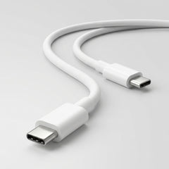 A white USB-C to USB-C cable shown on a clean light gray background, with both connectors visible and the cable curving through the center.