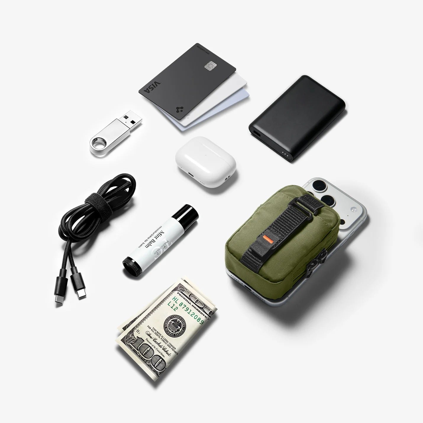 Collection of small electronic devices and accessories on a white background