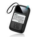 A black 120W portable power bank with a built-in carrying strap, featuring a white Chinese warning label on the front and a small light blue protective film on the top right corner, set against a clean white background with a subtle reflection.
