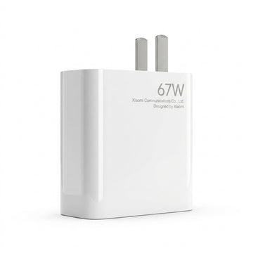 A white Xiaomi 67W wall charger with two silver metal pins, shown on a clean white background. The front of the charger features the text '67W', 'Xiaomi Communications Co.
