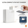 White Xiaomi ultra-compact 67W fast charger shown on a light gray background with feature callouts, including a hand holding a smaller matching charger, a smartphone on a wireless pad, and a pocket-fit inset.