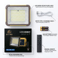 Solar flood light kit with a rectangular solar panel light, white charging cable, two AAA batteries, retail packaging box, and remote control, all labeled with feature callouts on a white background.