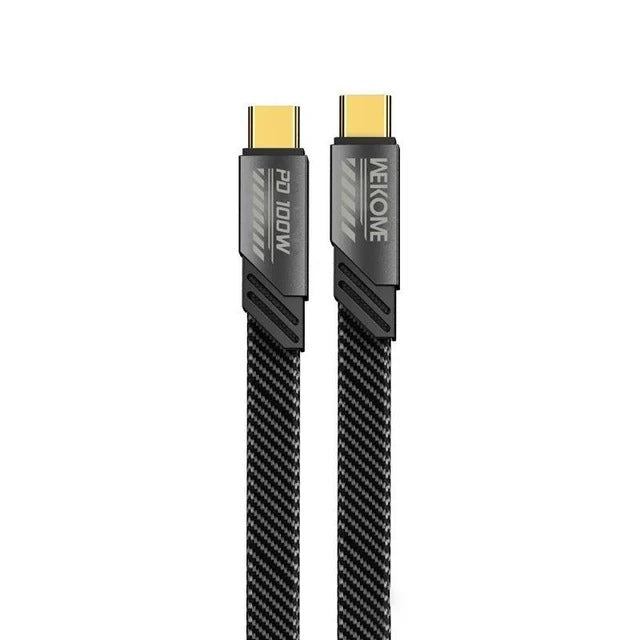 A coiled black braided HDMI cable with gold-toned USB-C connectors, featuring visible branding on the connector housings, set against a clean white background.